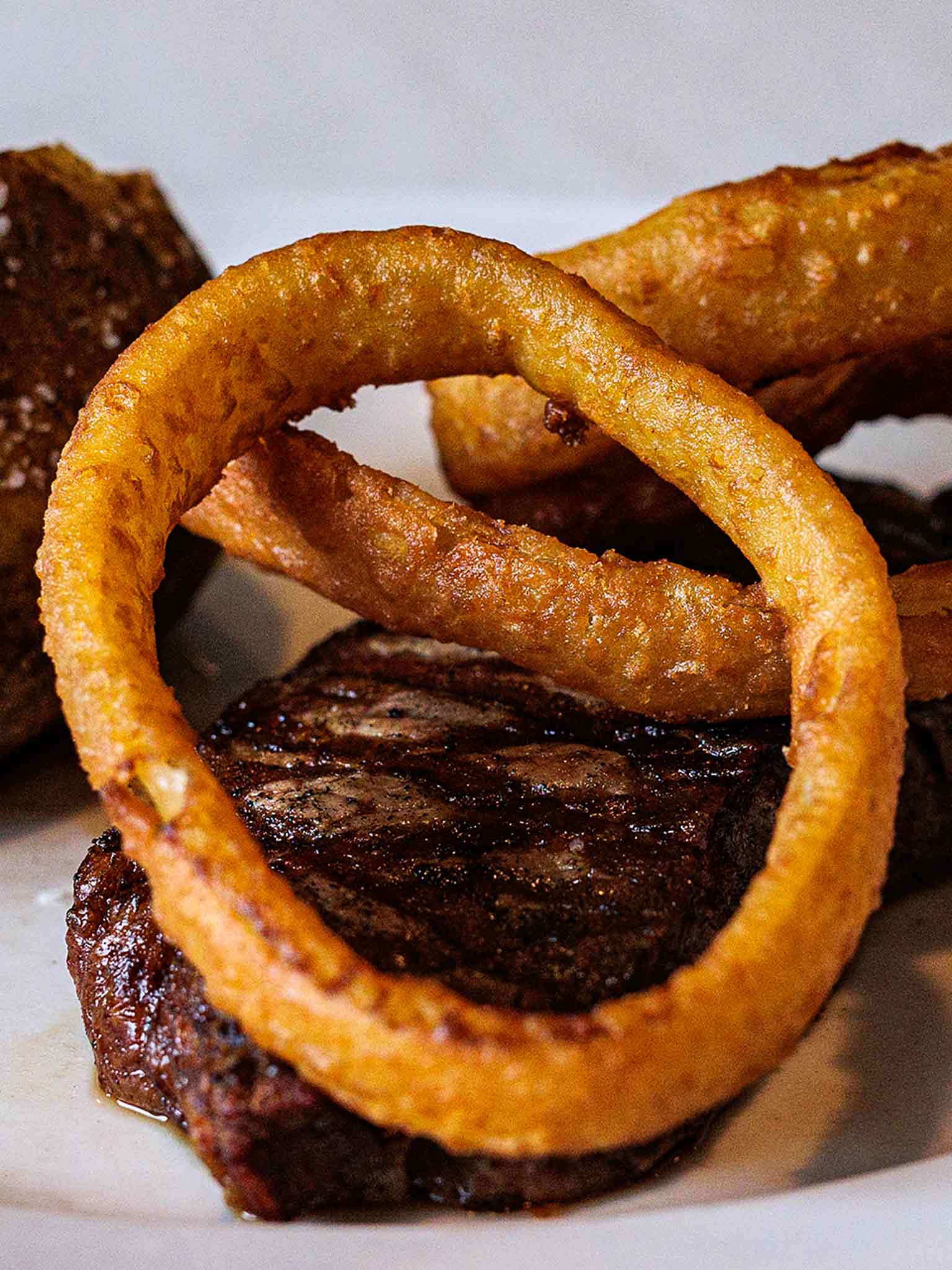 Steak Onion Rings and Baked Potato